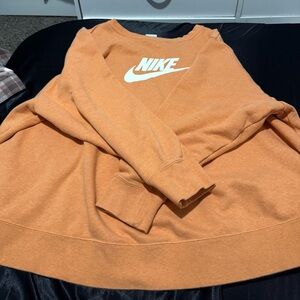 Orange Nike crew neck